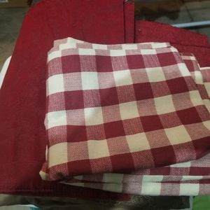 Red cloth table settings and valances.